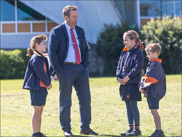 Our principal with students