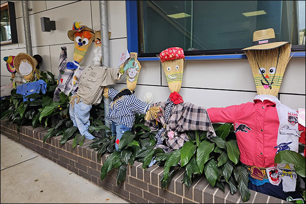 A line up of scarecrows