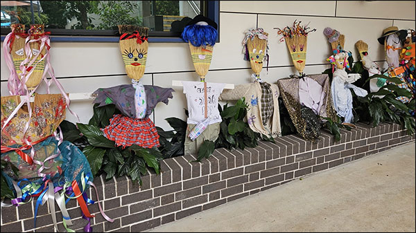 A line up of scarecrows