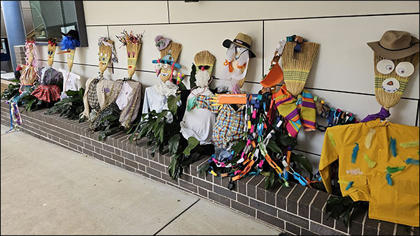 A line up of scarecrows